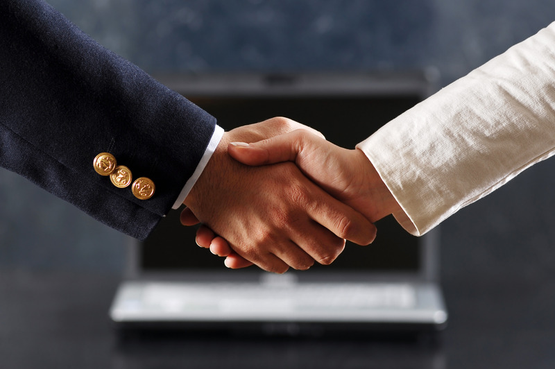 A handshake after agreeing on a high growth investment zone